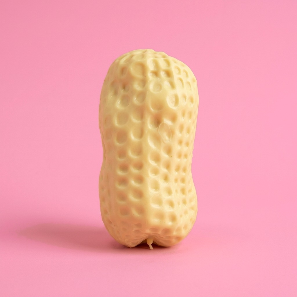 Tall crunchy peanut shell squishy with a dimpled texture