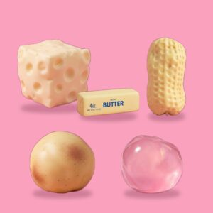 Five squishies: cheese cube, peanut, butter stick, potato and clear coconut oil ball